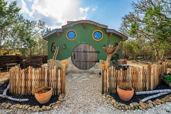 woodsman hobbit with hot tub and fireplace