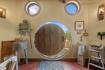 woodsman hobbit with hot tub and fireplace