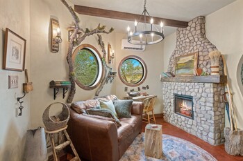 woodsman hobbit with hot tub and fireplace