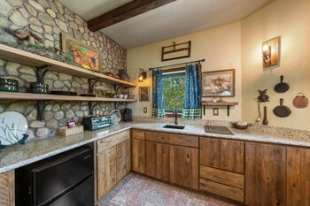 woodsman hobbit with hot tub and fireplace