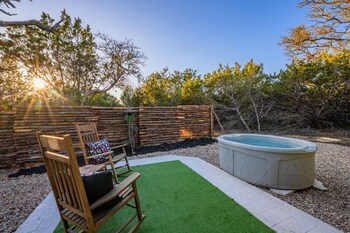 woodsman hobbit with hot tub and fireplace