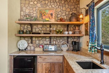 woodsman hobbit with hot tub and fireplace
