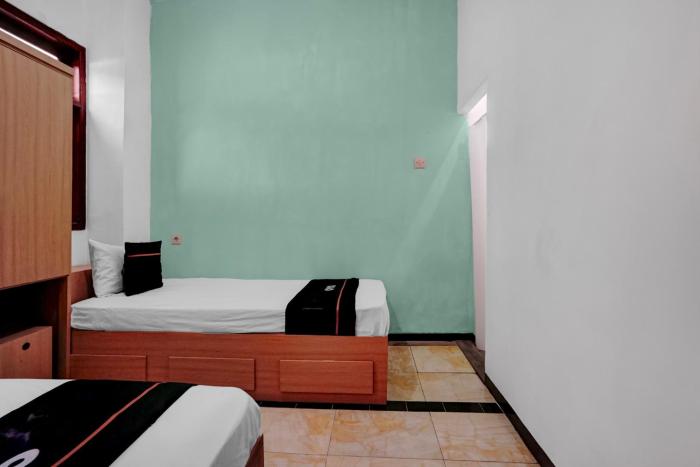 oyo 95035 harmony guest house syariah