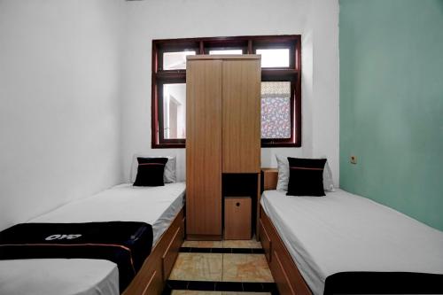 oyo 95035 harmony guest house syariah