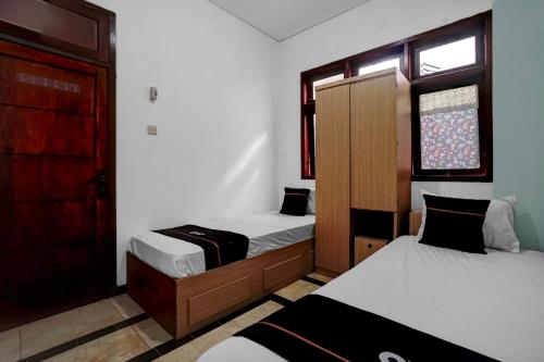 oyo 95035 harmony guest house syariah