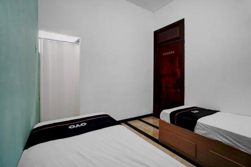 oyo 95035 harmony guest house syariah