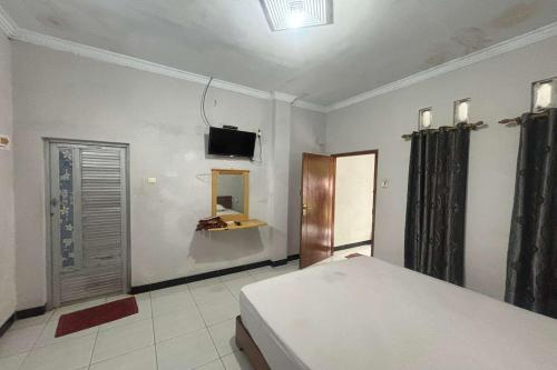 oyo 95050 penginapan sekarsari syariah