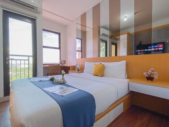 orange style studio at transpark cibubur apartment