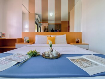 orange style studio at transpark cibubur apartment