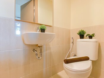 comfy warm tone studio at meikarta apartment