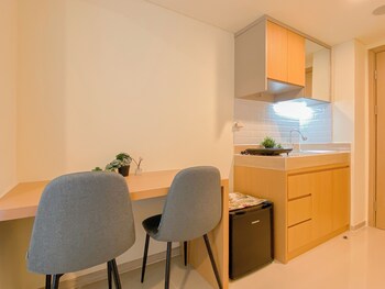 comfy warm tone studio at meikarta apartment