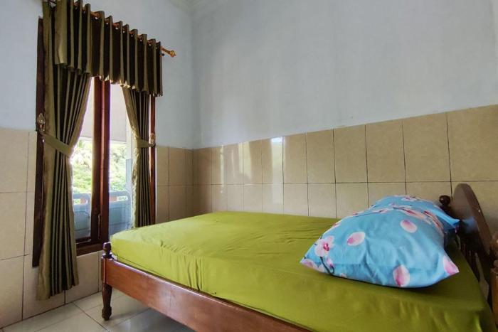 oyo 95055 homestay panasan pak budi