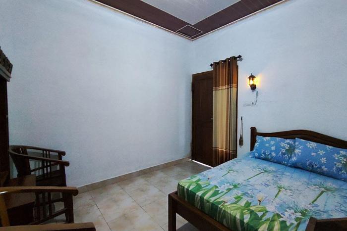 oyo 95055 homestay panasan pak budi