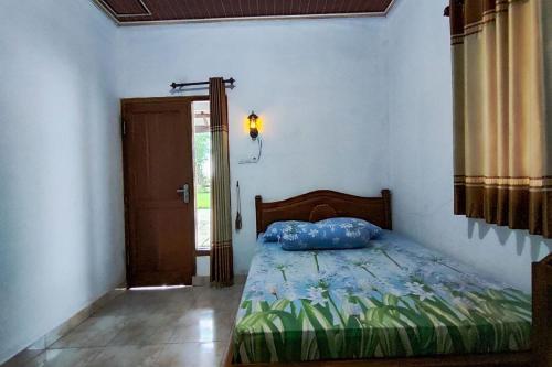 oyo 95055 homestay panasan pak budi