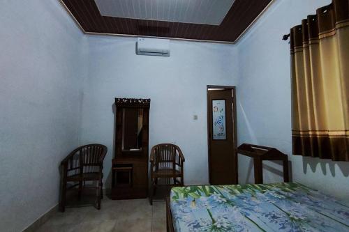 oyo 95055 homestay panasan pak budi