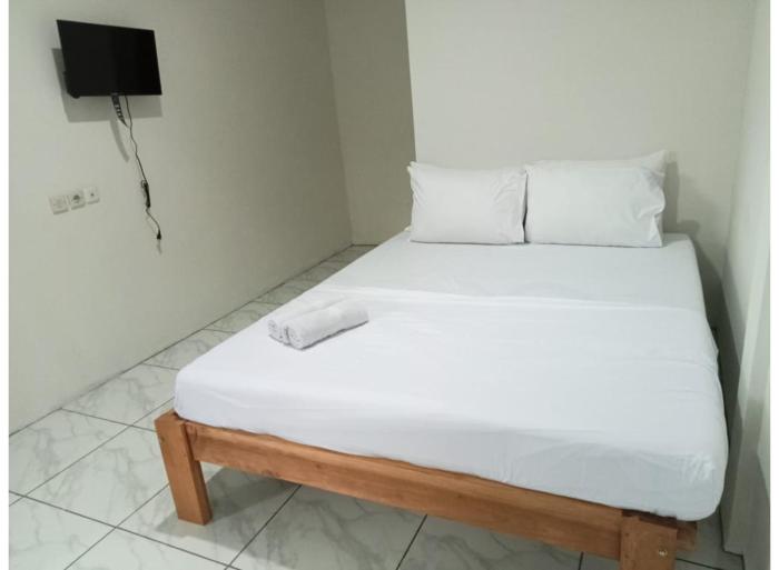 hotel o 95063 afifah syariah guest house manado