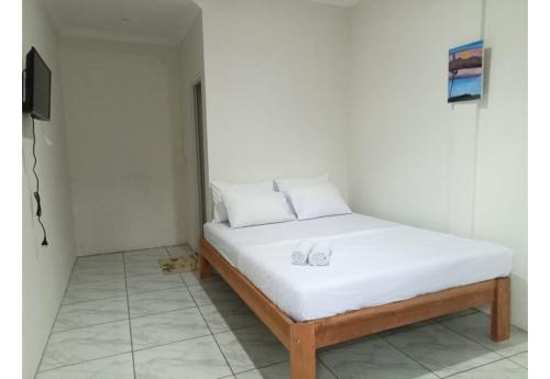 hotel o 95063 afifah syariah guest house manado