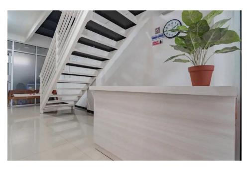 hotel o 95063 afifah syariah guest house manado
