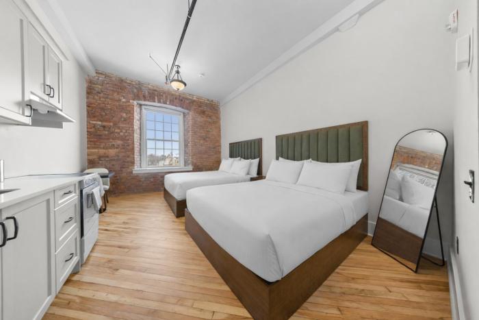 tri century mill suites