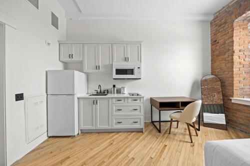 tri century mill suites