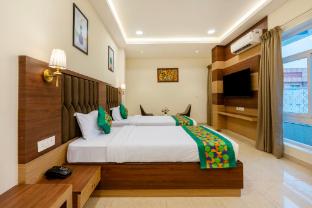 treebo premium pine tree courtyard