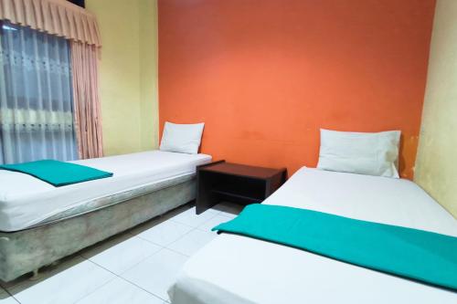 hotel pattimura powered by cocotel