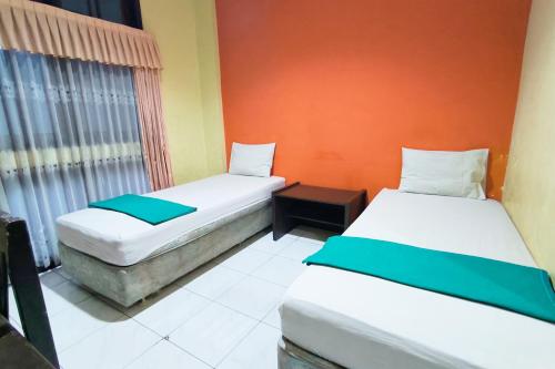 hotel pattimura powered by cocotel