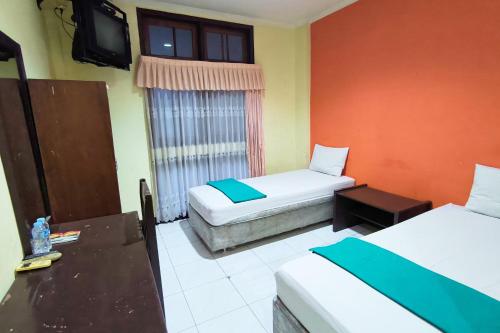hotel pattimura powered by cocotel