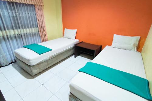 hotel pattimura powered by cocotel
