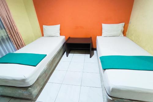 hotel pattimura powered by cocotel