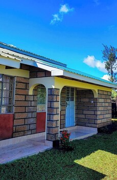 calm breeze resort rwanchege