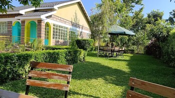 calm breeze resort rwanchege