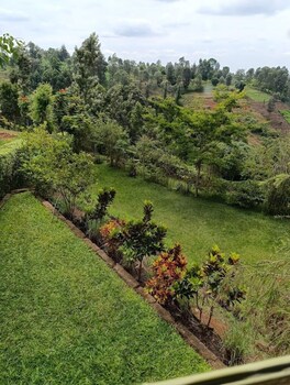 calm breeze resort rwanchege