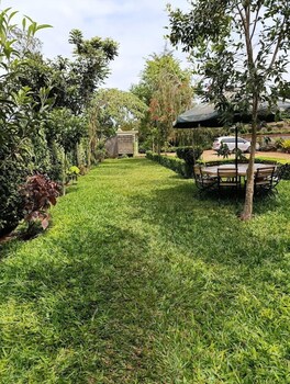 calm breeze resort rwanchege