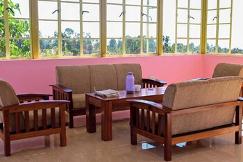 calm breeze resort rwanchege