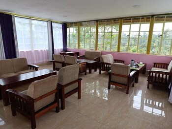 calm breeze resort rwanchege