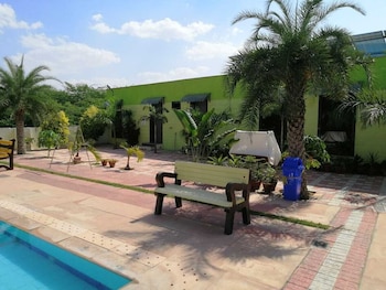 Palm Farmhouse Resort & Swimming Pool,,3 star