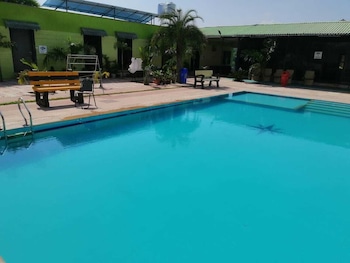 Palm Farmhouse Resort & Swimming Pool,,3 star