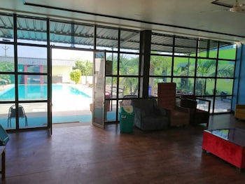 palm farmhouse resort and swimming pool