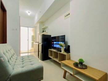 compact white 2br near rawa buaya station at vittoria residence