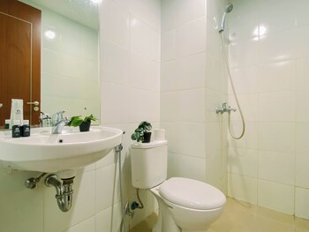 compact white 2br near rawa buaya station at vittoria residence