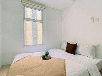 compact white 2br near rawa buaya station at vittoria residence