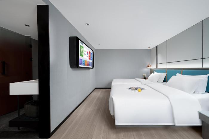 pin hotel guangzhou beijing road pedestrian street gongyuanqian metro station branch free deliver service to guangzhou baiyun international airport and free deliver service to canton fair complex during canton fair period