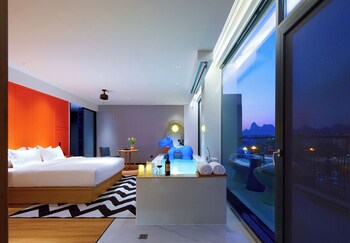 global village riverside hotel