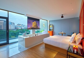 global village riverside hotel