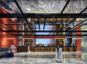 global village riverside hotel