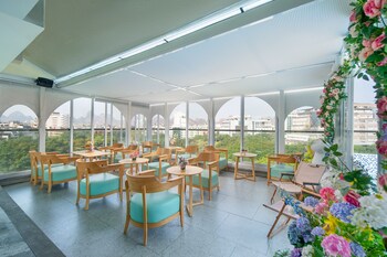global village riverside hotel