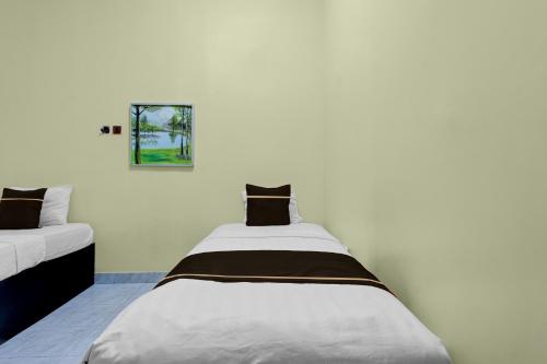 oyo 95136 jec plumbon homestay syariah