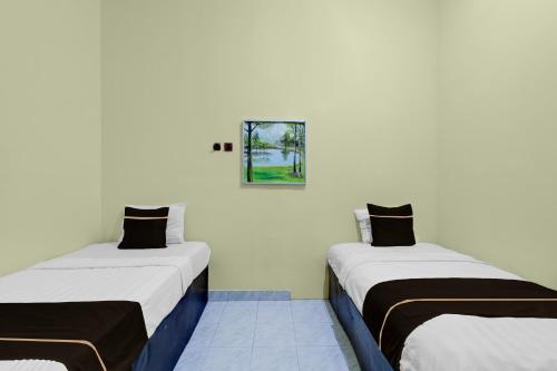 oyo 95136 jec plumbon homestay syariah