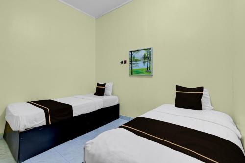 oyo 95136 jec plumbon homestay syariah
